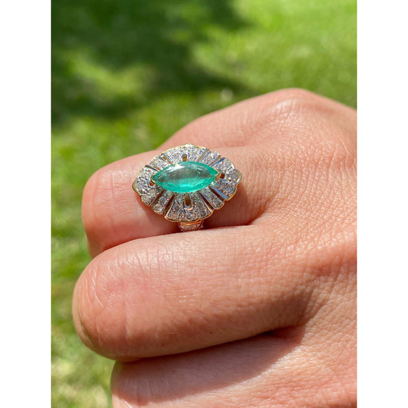 0.75 carat Marquise cut Emerald in 14k solid yellow gold Ring