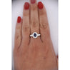 1.16 Carat Oval Blue Sapphire and Diamond Textured Halo Platinum Ring