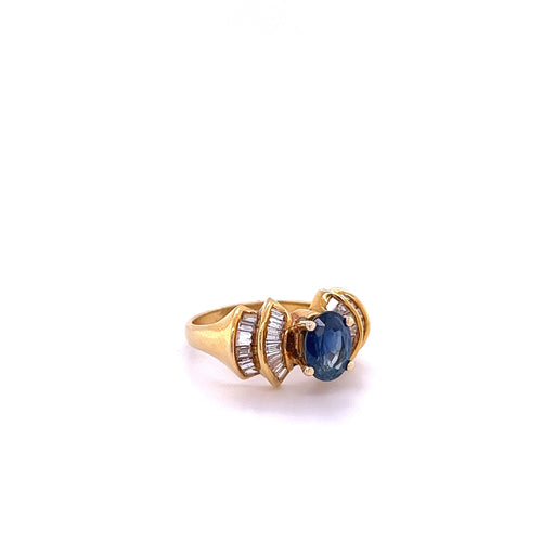 1.19 Carat Oval Cut Blue Sapphire with Baguette Cut Diamonds in 14k Gold Ring