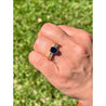 1.48 Carat Oval Cut Blue Sapphire With Princess Cut Diamond Ring in 18k Gold