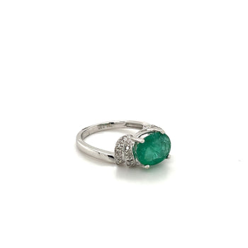 Bague 4 griffes en or blanc courbé rétro, avec émeraude taille ovale de 2.37 Carat – Assay Jewelers
