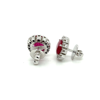 alt
Boucles d'oreilles en rubis taille ovale 3.5 carats sans chaleur avec halo de diamants ronds – Assay Jewelers