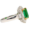 4.42 Carat TW Colombian Emerald with Round & Emerald Cut Diamond Halo Ring