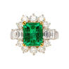 4.42 Carat TW Colombian Emerald with Round & Emerald Cut Diamond Halo Ring