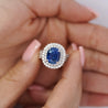 4.73ct GRS Certified Oval Blue Sapphire with Double Diamond Halo Ring