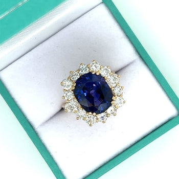 7.15 Carat Oval Cut Blue Sapphire & Diamond Halo Ring in 14K Yellow Gold – Assay Jewelers