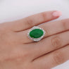 7.50 Carat Untreated Oval Green Jadeite with Baguette Diamonds in Platinum Ring