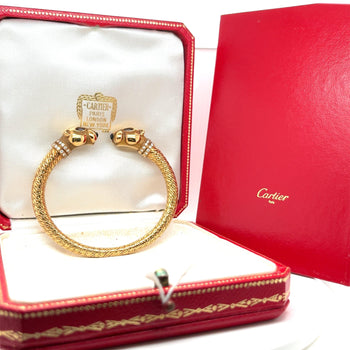 Bracelet jonc Panthère à double tête signé Cartier en or 18 carats avec boîte et papiers d'origine – Assay Jewelers
