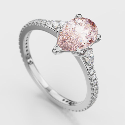 GIA Certified 1.10 Carat Fancy Light Pink Diamond Three Stone Ring