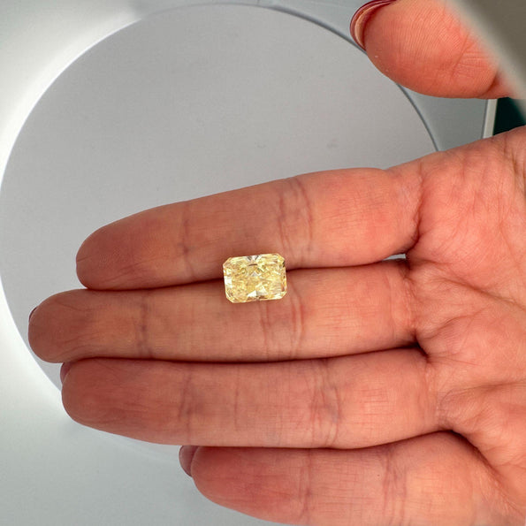 GIA Certified 4.12 Carat Fancy Yellow Radiant Cut Diamond Halo Engagement Ring