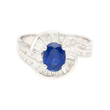 Natural 1.14 Carat Oval Cut Blue Sapphire with Round & Baguette Cut Diamonds in a Swirled 18K White Gold Ring Setting – Assay Jewelers