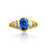 Oval geschliffener blauer Saphir und Baguette geschliffener Diamant Verlobungsring