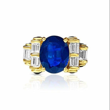 Bague style rétro en saphir bleu de Chanthaburi avec diamants baguette latéraux – Assay Jewelers