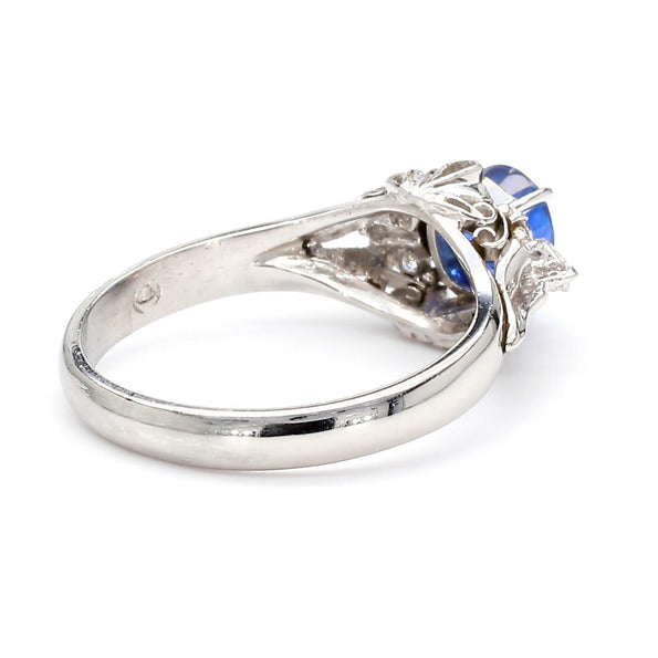 Vintage 0.97 Carat Oval Blue Sapphire & Diamond Filigree in Platinum Floral Ring