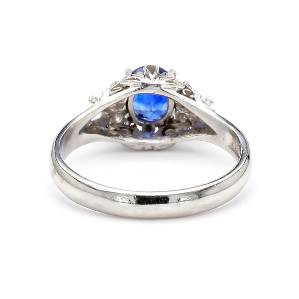 Vintage 0.97 Carat Oval Blue Sapphire & Diamond Filigree in Platinum Floral Ring