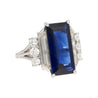 Vintage 8.56 carat Vivid Blue Sapphire and Trapezoid Diamond Ring in Platinum