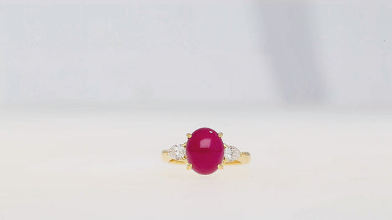 4.93 Carat Cabochon Cut Ruby & Oval Cut Diamond Three Stone 18K Ring