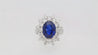 GRS Certified 5.79 Carat Oval Royal Blue Sapphire and Diamond Halo Ring