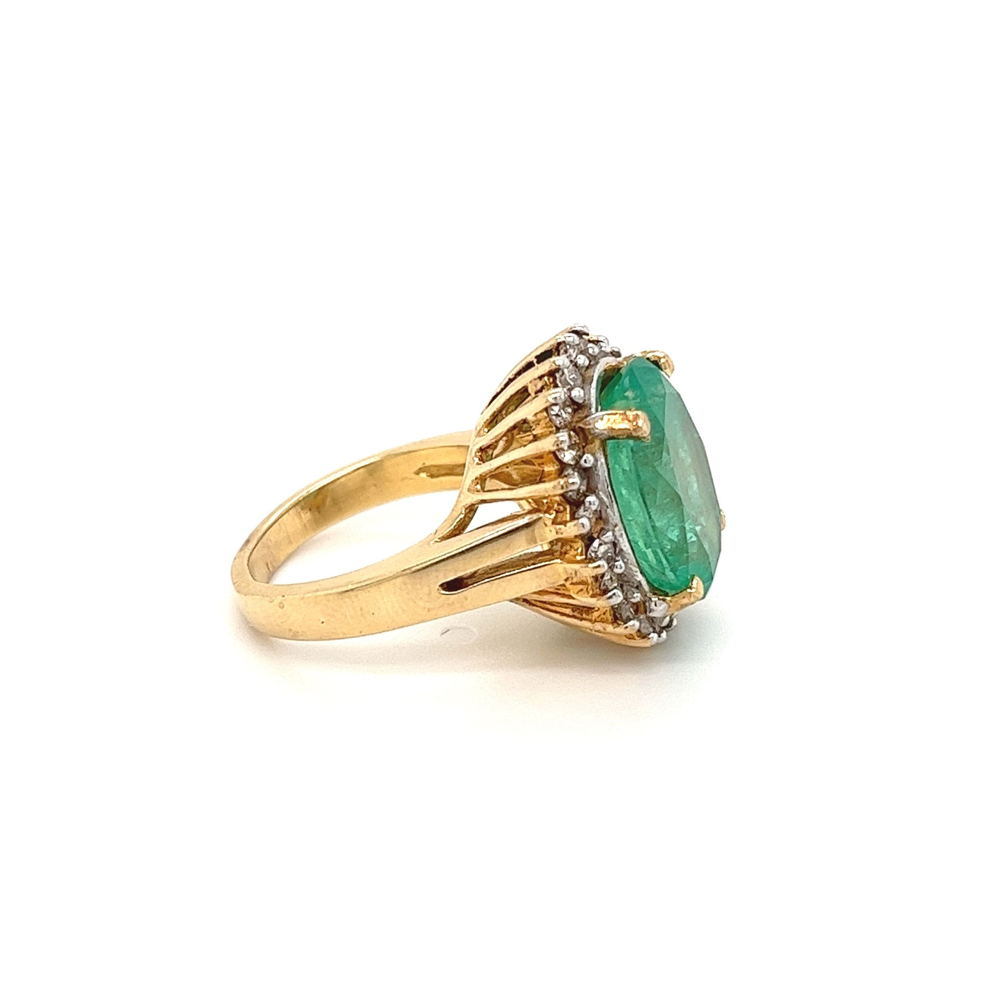 Vintage 6.88 carat Colombian Emerald in 14k yellow gold ring
